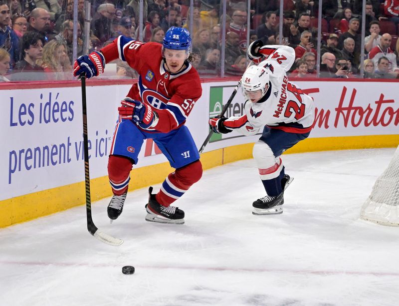 Feb 17, 2024; Montreal, Quebec, CAN; Montreal Canadiens forward Michael Pezzetta (55) plays the puck and Washington Capitals forward Connor McMichael (24) forechecks during the first period at the Bell Centre. Mandatory Credit: Eric Bolte-USA TODAY Sports