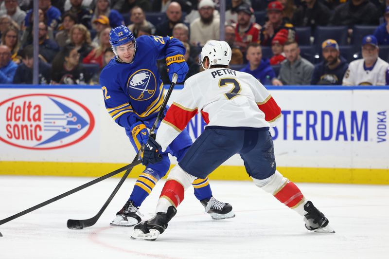 Jan 12, 2026; Buffalo, New York, USA;  Florida Panthers defenseman Jeff Petry (2) looks to block a shot by Buffalo Sabres right wing Jack Quinn (22) during the second period at KeyBank Center. Mandatory Credit: Timothy T. Ludwig-Imagn Images