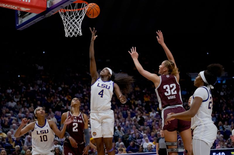 Jan 11, 2024; Baton Rouge, Louisiana, USA; LSU Lady Tigers guard Flau'jae Johnson (4) shoots against Texas A&M Aggies forward Lauren Ware (32) during the second half at Pete Maravich Assembly Center. Mandatory Credit: Matthew Hinton-USA TODAY Sports