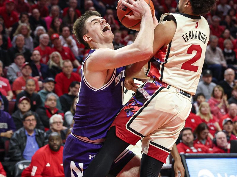 Feb 15, 2024; Piscataway, New Jersey, USA; Northwestern Wildcats guard Brooks Barnhizer (13) drives to the basket against Rutgers Scarlet Knights guard Noah Fernandes (2) during the first half at Jersey Mike's Arena. Mandatory Credit: Vincent Carchietta-USA TODAY Sports