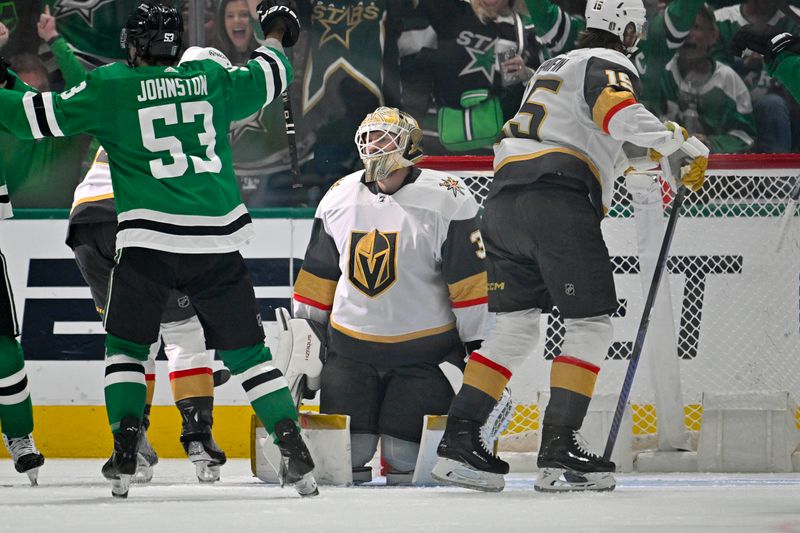 May 1, 2024; Dallas, Texas, USA; Vegas Golden Knights goaltender Adin Hill (33) reacts to giving up a power play goal to Dallas Stars center Matt Duchene (not pictured) as center Wyatt Johnston (53) celebrates during the first period in game five of the first round of the 2024 Stanley Cup Playoffs at the American Airlines Center. Mandatory Credit: Jerome Miron-USA TODAY Sports