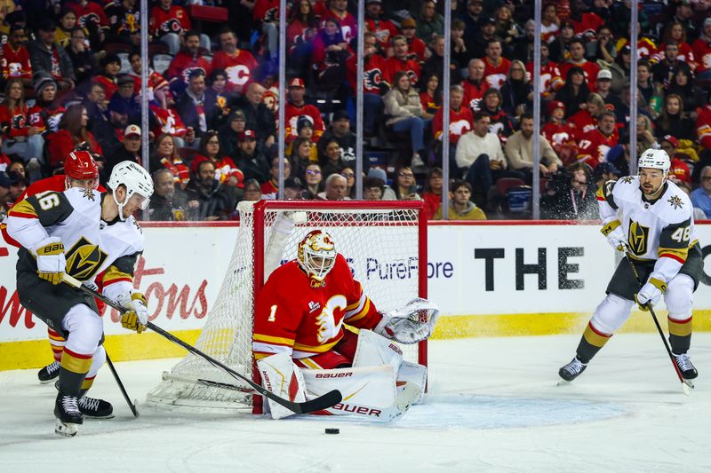 Dec 20, 2025; Calgary, Alberta, CAN; Calgary Flames goaltender Devin Cooley (1) guards his net against the Vegas Golden Knights during the first period at Scotiabank Saddledome. Mandatory Credit: Sergei Belski-Imagn Images