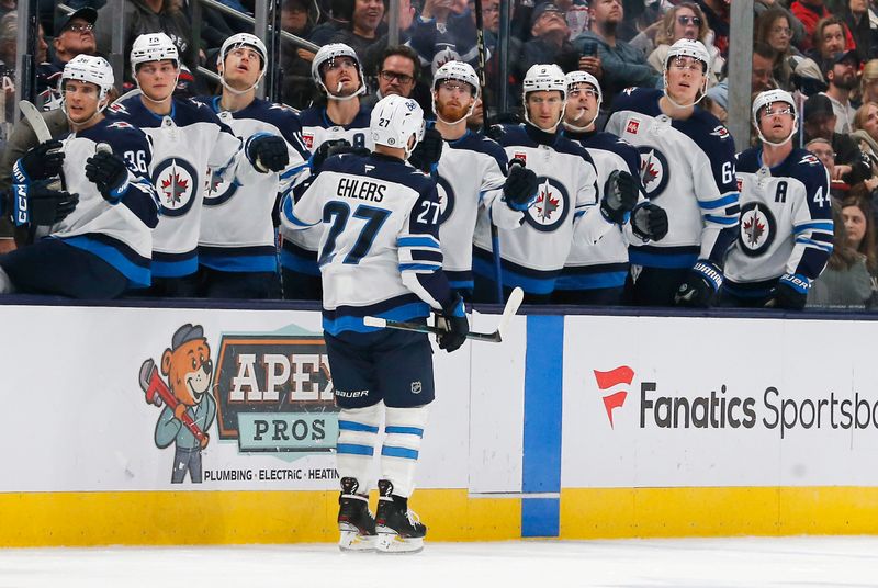 Nov 1, 2024; Columbus, Ohio, USA; Winnipeg Jets left wing Nikolaj Ehlers (27) celebrates his goal against the Columbus Blue Jackets during the first period at Nationwide Arena. Mandatory Credit: Russell LaBounty-Imagn Images