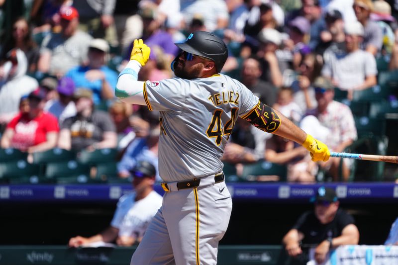 Jun 16, 2024; Denver, Colorado, USA; Pittsburgh Pirates first base Rowdy Tellez (44) hits a two-run single in the seventh inning against the Colorado Rockies at Coors Field. Mandatory Credit: Ron Chenoy-USA TODAY Sports