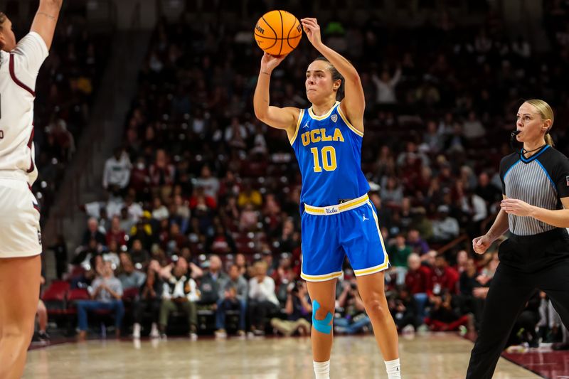 Nov 29, 2022; Columbia, South Carolina, USA; UCLA Bruins guard Gina Conti (10) shoots against the South Carolina Gamecocks in the second half at Colonial Life Arena. Mandatory Credit: Jeff Blake-USA TODAY Sports