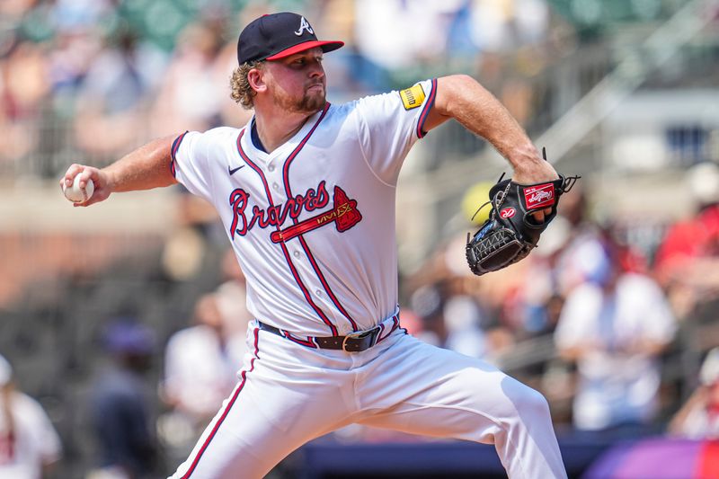 Jun 30, 2024; Cumberland, Georgia, USA; Atlanta Braves starting pitcher Spencer Schwellenbach (56) pitches against the Pittsburgh Pirates during the third inning at Truist Park. Mandatory Credit: Dale Zanine-USA TODAY Sports