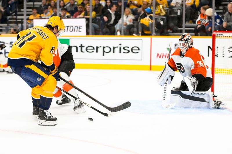 Nov 27, 2024; Nashville, Tennessee, USA;  Philadelphia Flyers goaltender Aleksei Kolosov (35) blocks the shot of Nashville Predators center Jonathan Marchessault (81) during the third period at Bridgestone Arena. Mandatory Credit: Steve Roberts-Imagn Images