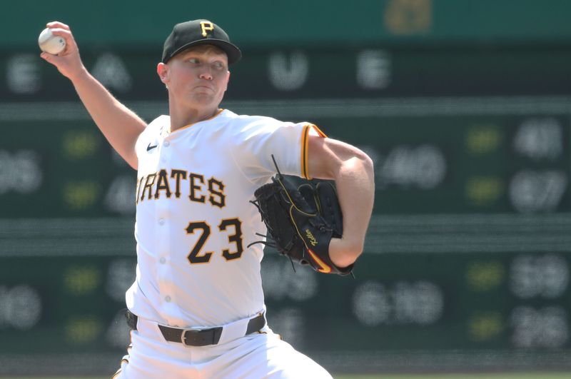 Apr 9, 2025; Pittsburgh, Pennsylvania, USA;  Pittsburgh Pirates starting pitcher Mitch Keller (23) delivers a pitch against the St. Louis Cardinals during the first inning at PNC Park. Mandatory Credit: Charles LeClaire-Imagn Images
