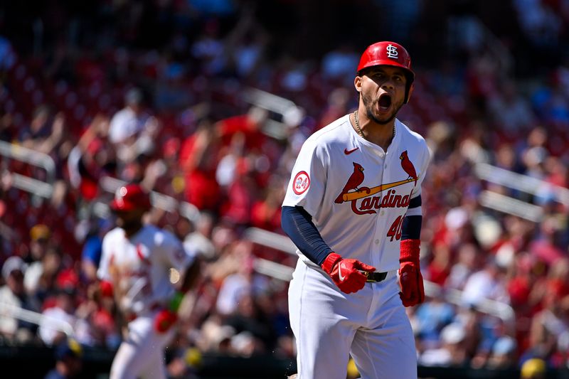 Aug 22, 2024; St. Louis, Missouri, USA;  St. Louis Cardinals catcher Willson Contreras (40) reacts after drawing a walk with the bases loaded against the Milwaukee Brewers during the seventh inning at Busch Stadium. Mandatory Credit: Jeff Curry-USA TODAY Sports