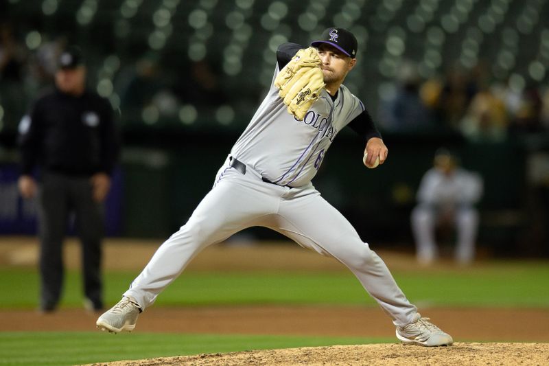 May 22, 2024; Oakland, California, USA; Colorado Rockies pitcher Jalen Beeks (68) delivers a pitch against the Oakland Athletics during the ninth inning at Oakland-Alameda County Coliseum. Mandatory Credit: D. Ross Cameron-USA TODAY Sports