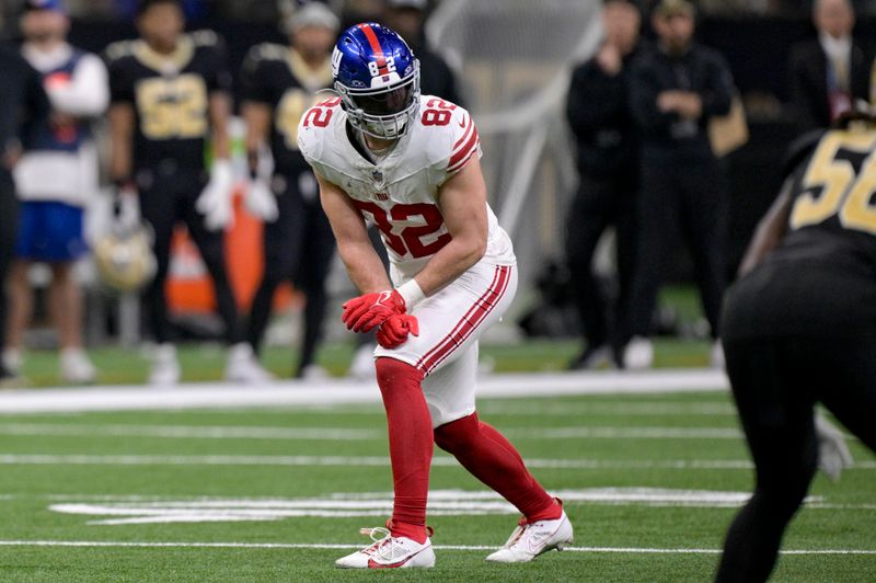 New York Giants tight end Daniel Bellinger (82) lines up during an NFL football game against the New Orleans Saints in New Orleans, Sunday, Dec. 17, 2023. (AP Photo/Matthew Hinton)