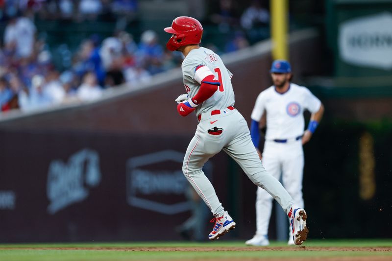 Jul 2, 2024; Chicago, Illinois, USA; Philadelphia Phillies shortstop Trea Turner (7) rounds the bases after hitting a solo home run against the Chicago Cubs during the third inning at Wrigley Field. Mandatory Credit: Kamil Krzaczynski-USA TODAY Sports