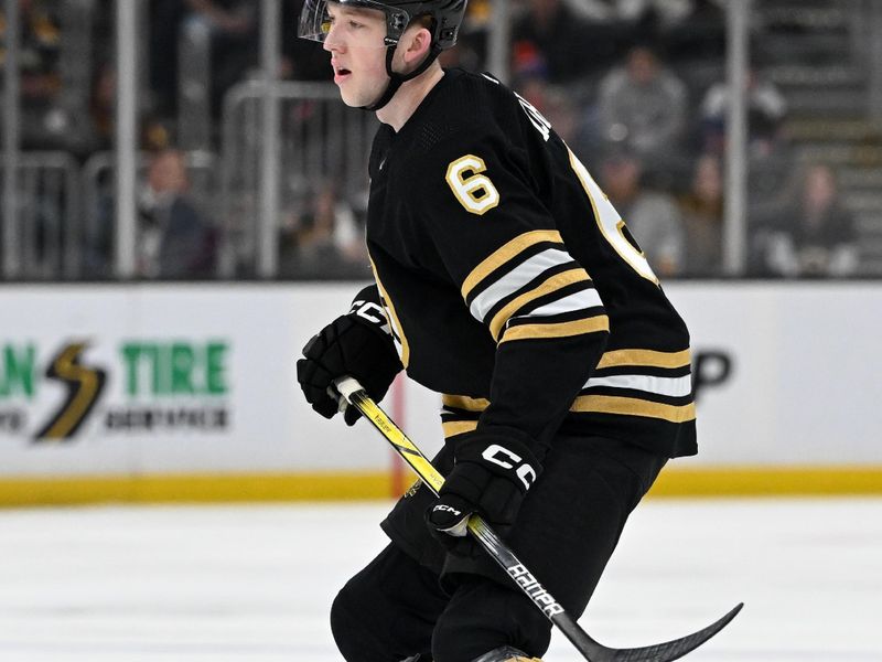 Nov 9, 2023; Boston, Massachusetts, USA; Boston Bruins defenseman Mason Lohrei (6) watches a face-off against the New York Islanders during the second period at the TD Garden. Mandatory Credit: Brian Fluharty-USA TODAY Sports