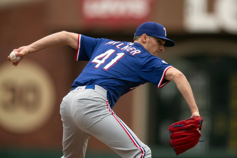 Apr 26, 2025; San Francisco, California, USA; Texas Rangers pitcher Hoby Milner (41) delivers a pitch against the San Francisco Giants during the seventh inning at Oracle Park. Mandatory Credit: D. Ross Cameron-Imagn Images