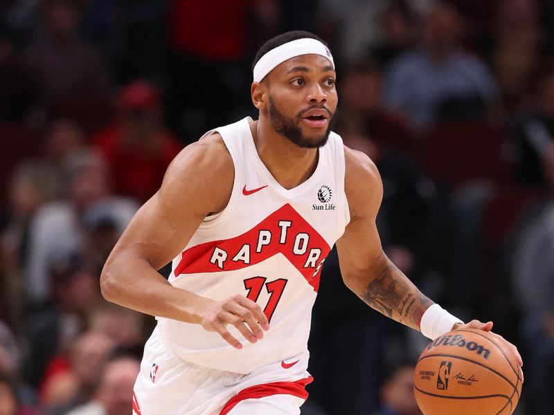 CHICAGO, ILLINOIS - JANUARY 30: Bruce Brown #11 of the Toronto Raptors dribbles up the court against the Chicago Bulls during the second half at the United Center on January 30, 2024 in Chicago, Illinois. NOTE TO USER: User expressly acknowledges and agrees that, by downloading and or using this photograph, User is consenting to the terms and conditions of the Getty Images License Agreement.  (Photo by Michael Reaves/Getty Images)