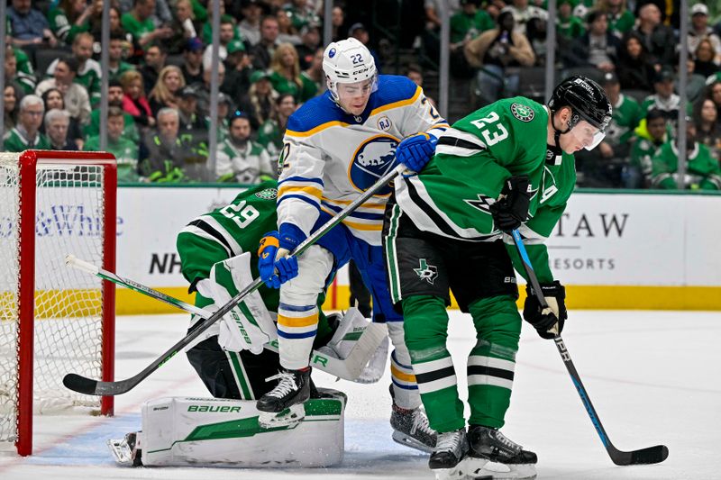 Apr 9, 2024; Dallas, Texas, USA; Buffalo Sabres right wing Jack Quinn (22) battles for position between Dallas Stars goaltender Jake Oettinger (29) and defenseman Esa Lindell (23) during the first period at the American Airlines Center. Mandatory Credit: Jerome Miron-USA TODAY Sports