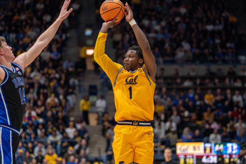 Jan 14, 2026; Berkeley, California, USA; California Golden Bears guard Dejuan Campbell (1) shoots a three point basket against Duke Blue Devils guard Nikolas Khamenia (14) during the second half at Haas Pavilion. Mandatory Credit: Neville E. Guard-Imagn Images