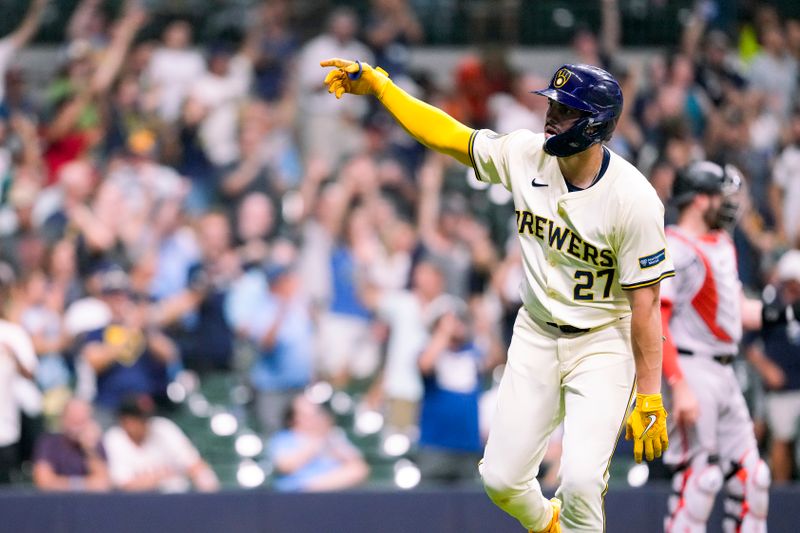 Aug 27, 2024; Milwaukee, Wisconsin, USA;  Milwaukee Brewers shortstop Willy Adames (27) celebrates after hitting a home run during the sixth inning against the San Francisco Giants at American Family Field. Mandatory Credit: Jeff Hanisch-USA TODAY Sports