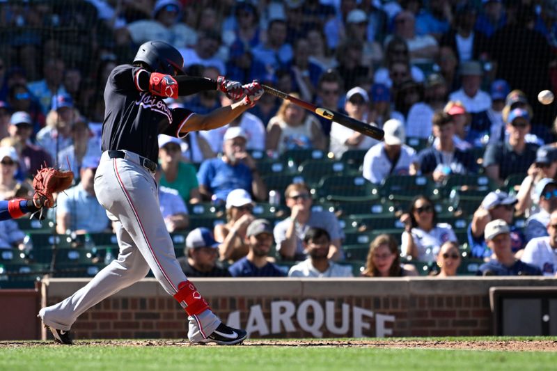 Sep 21, 2024; Chicago, Illinois, USA;  Washington Nationals third base José Tena (8) breaks his bat during the fourth inning against the Chicago Cubs at Wrigley Field. Mandatory Credit: Matt Marton-Imagn Images