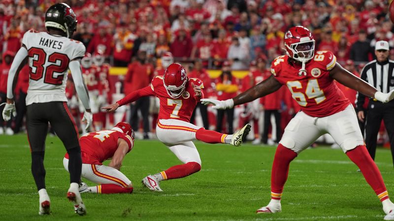 Kansas City Chiefs' Harrison Butker (7) kicks a field goal against the Tampa Bay Buccaneers during the first half of an NFL football game, Monday, Nov. 4, 2024, in Kansas City, Mo. (AP Photo/Charlie Riedel)