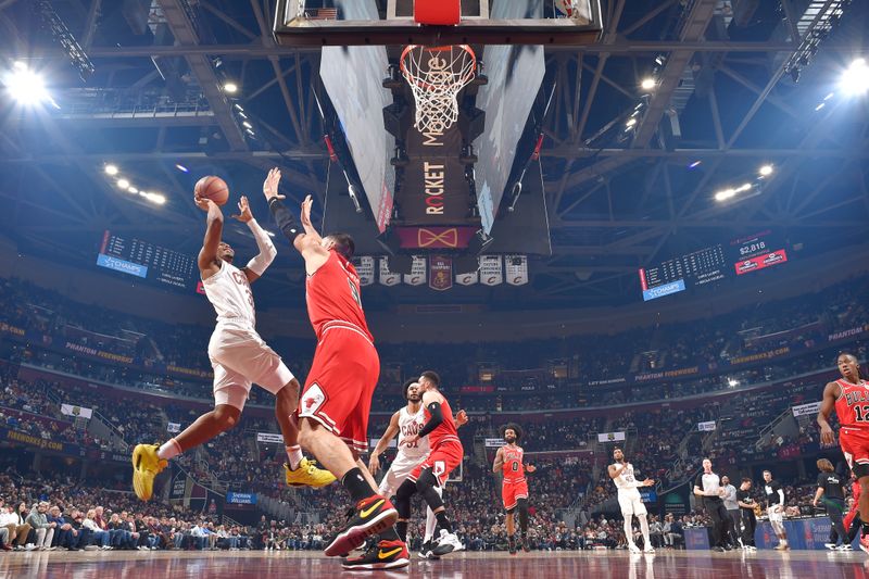 CLEVELAND, OH - JANUARY 15: Isaac Okoro #35 of the Cleveland Cavaliers shoots the ball during the game against the Chicago Bulls on January 15, 2024 at Rocket Mortgage FieldHouse in Cleveland, Ohio. NOTE TO USER: User expressly acknowledges and agrees that, by downloading and/or using this Photograph, user is consenting to the terms and conditions of the Getty Images License Agreement. Mandatory Copyright Notice: Copyright 2024 NBAE (Photo by David Liam Kyle/NBAE via Getty Images)