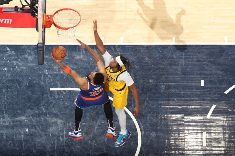 INDIANAPOLIS, IN - MAY 25:  Karl-Anthony Towns #32 of the New York Knicks drives to the basket during the game against the Indiana Pacers  during Game 3 of the 2025 Eastern Conference Finals on May 25, 2025 at Gainbridge Fieldhouse in Indianapolis, Indiana. NOTE TO USER: User expressly acknowledges and agrees that, by downloading and or using this Photograph, user is consenting to the terms and conditions of the Getty Images License Agreement. Mandatory Copyright Notice: Copyright 2025 NBAE (Photo by Nathaniel S. Butler/NBAE via Getty Images)