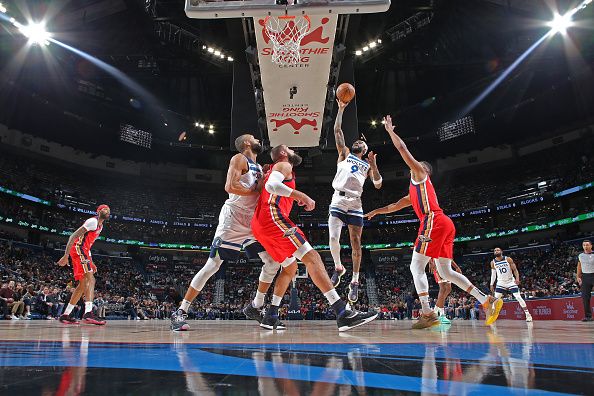 NEW ORLEANS, LA - DECEMBER 11: Nickeil Alexander-Walker #9 of the Minnesota Timberwolves shoots the ball during the game against the New Orleans Pelicans  on December 11, 2023 at the Smoothie King Center in New Orleans, Louisiana. NOTE TO USER: User expressly acknowledges and agrees that, by downloading and or using this Photograph, user is consenting to the terms and conditions of the Getty Images License Agreement. Mandatory Copyright Notice: Copyright 2023 NBAE (Photo by Layne Murdoch Jr./NBAE via Getty Images)