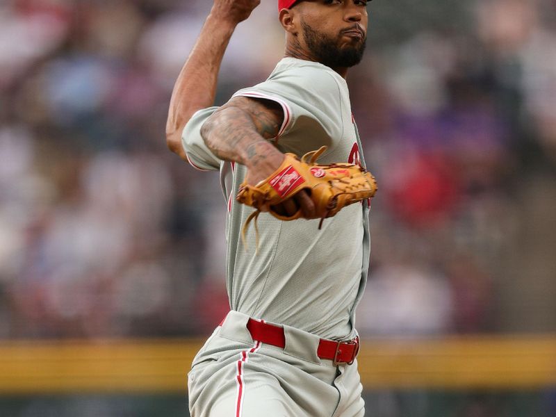 May 24, 2024; Denver, Colorado, USA; Philadelphia Phillies starting pitcher Cristopher Sanchez (61) pitches in the first inning against the Colorado Rockies at Coors Field. Mandatory Credit: Isaiah J. Downing-USA TODAY Sports