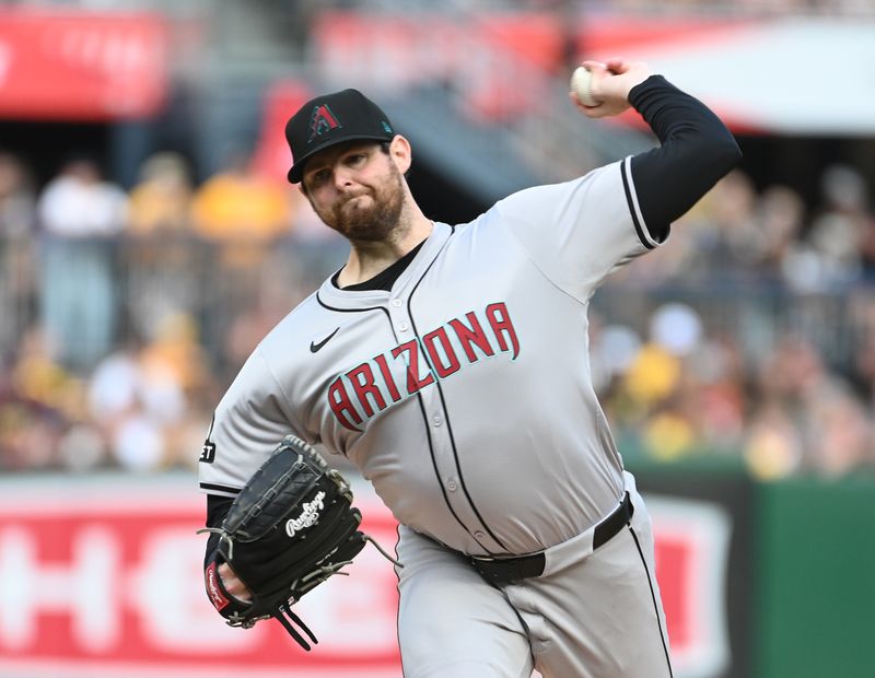 Aug 3, 2024; Pittsburgh, Pennsylvania, USA;  Arizona Diamondbacks starting pitcher Jordan Montgomery (52) throws against the Pittsburgh Pirates in the first inning at PNC Park. Mandatory Credit: Philip G. Pavely-USA TODAY Sports
