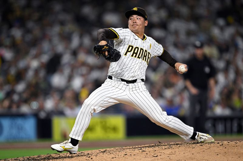 Jun 20, 2024; San Diego, California, USA; San Diego Padres relief pitcher Yuki Matsui (1) pitches against the Milwaukee Brewers during the seventh inning at Petco Park. Mandatory Credit: Orlando Ramirez-USA TODAY Sports