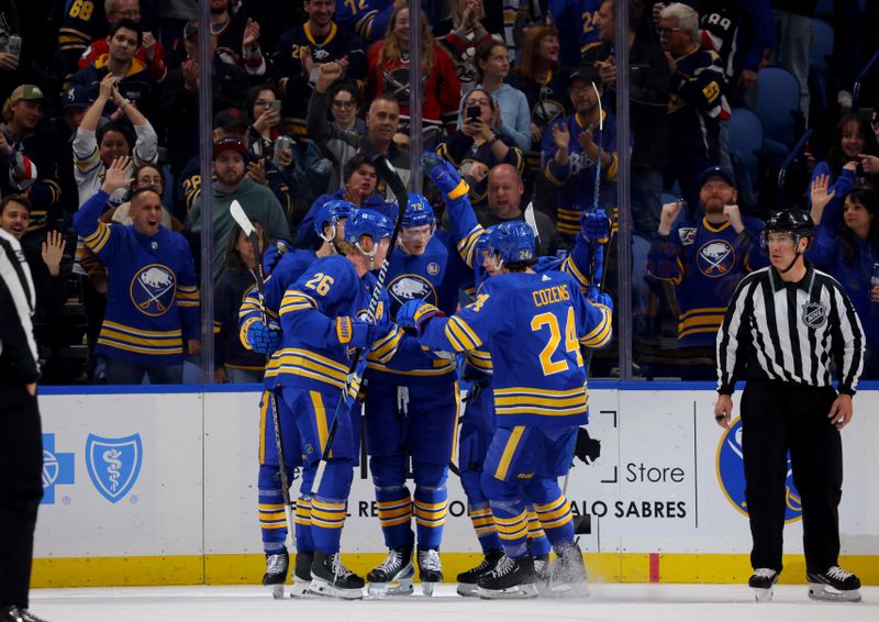 Oct 19, 2023; Buffalo, New York, USA;  Buffalo Sabres right wing Tage Thompson (72) celebrates his goal with teammates during the first period against the Calgary Flames at KeyBank Center. Mandatory Credit: Timothy T. Ludwig-USA TODAY Sports