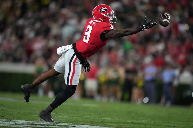 Sep 23, 2023; Athens, Georgia, USA; Georgia Bulldogs wide receiver Jackson Meeks (9) attempts to catch the ball against the UAB Blazers in the first half at Sanford Stadium. Mandatory Credit: Kirby Lee-USA TODAY Sports