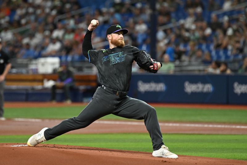 Aug 10, 2024; St. Petersburg, Florida, USA; Tampa Bay Rays starting pitcher Drew Rasmussen (57)  throws a pitch in the first inning against the Baltimore Orioles at Tropicana Field. Mandatory Credit: Jonathan Dyer-USA TODAY Sports