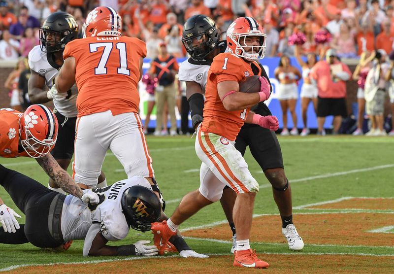 Oct 7, 2023; Clemson, South Carolina, USA; Clemson Tigers running back Will Shipley (1) scores against the Wake Forest Demon Deacons during the fourth quarter at Memorial Stadium. Mandatory Credit: Ken Ruinard-USA TODAY Sports