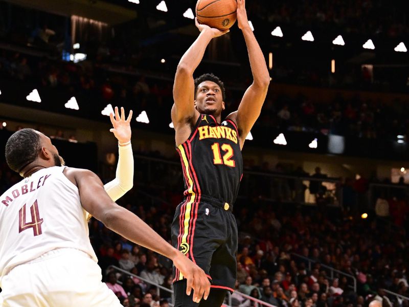 ATLANTA, GA - NOVEMBER 29: De'Andre Hunter #12 of the Atlanta Hawks shoots the ball during the game against the Cleveland Cavaliers during the Emirates NBA Cup game on November 29, 2024 at State Farm Arena in Atlanta, Georgia.  NOTE TO USER: User expressly acknowledges and agrees that, by downloading and/or using this Photograph, user is consenting to the terms and conditions of the Getty Images License Agreement. Mandatory Copyright Notice: Copyright 2024 NBAE (Photo by Adam Hagy/NBAE via Getty Images)