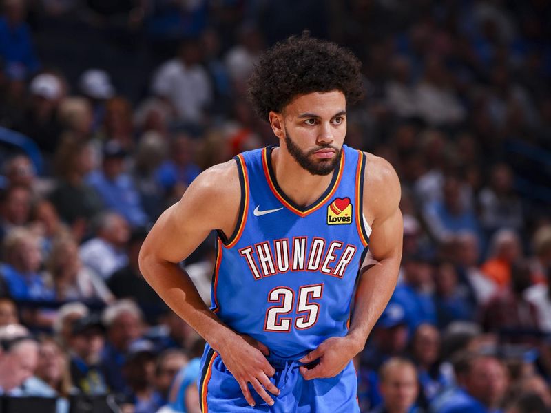 OKLAHOMA CITY, OK - NOVEMBER 13:  Ajay Mitchell #25 of the Oklahoma City Thunder looks on during the game against the New Orleans Pelicans on November 13, 2024 at Paycom Center in Oklahoma City, Oklahoma. NOTE TO USER: User expressly acknowledges and agrees that, by downloading and or using this photograph, User is consenting to the terms and conditions of the Getty Images License Agreement. Mandatory Copyright Notice: Copyright 2024 NBAE (Photo by Zach Beeker/NBAE via Getty Images)