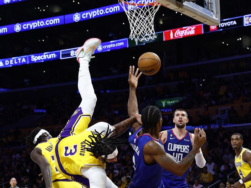 LOS ANGELES, CALIFORNIA - OCTOBER 20:  Anthony Davis #3 of the Los Angeles Lakers fouls Kawhi Leonard #2 of the LA Clippers in the third quarter at Crypto.com Arena on October 20, 2022 in Los Angeles, California.  NOTE TO USER: User expressly acknowledges and agrees that, by downloading and/or using this photograph, user is consenting to the terms and conditions of the Getty Images License Agreement.  (Photo by Ronald Martinez/Getty Images)