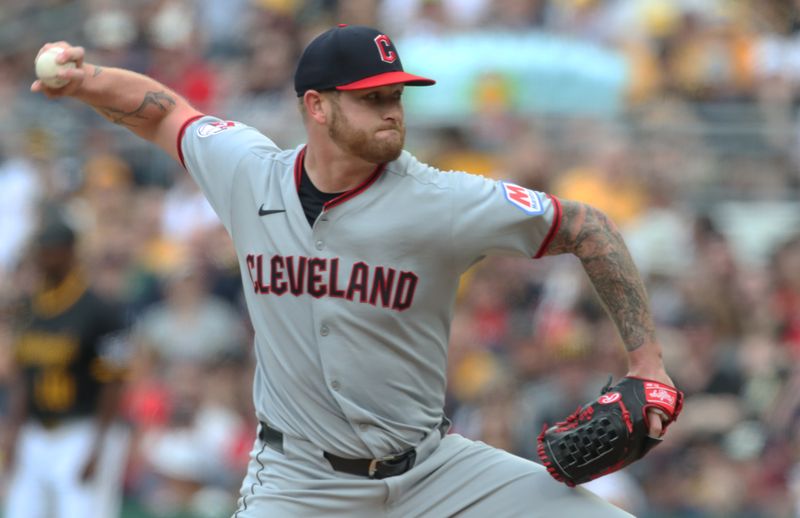 Apr 19, 2025; Pittsburgh, Pennsylvania, USA;  Cleveland Guardians starting pitcher Ben Lively (39) delivers a pitch against the Pittsburgh Pirates during the first inning at PNC Park. Mandatory Credit: Charles LeClaire-Imagn Images
