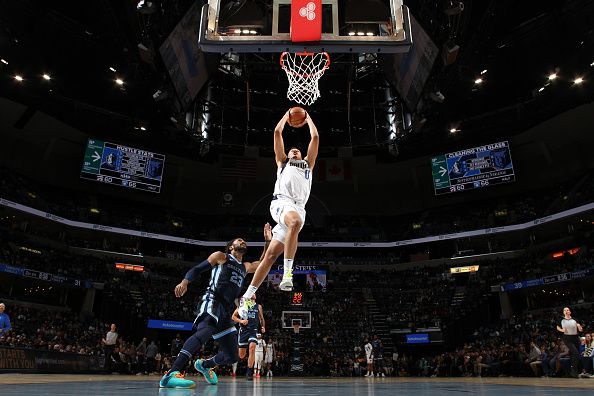 MEMPHIS, TN - DECEMBER 11:  Dante Exum #0 of the Dallas Mavericks dunks the ball during the game against the Memphis Grizzlies on December 11, 2023 at FedExForum in Memphis, Tennessee. NOTE TO USER: User expressly acknowledges and agrees that, by downloading and or using this photograph, User is consenting to the terms and conditions of the Getty Images License Agreement. Mandatory Copyright Notice: Copyright 2023 NBAE (Photo by Joe Murphy/NBAE via Getty Images)