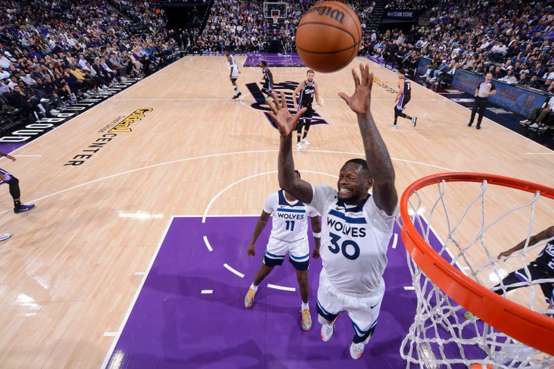 SACRAMENTO, CA - OCTOBER 24: Julius Randle #30 of the Minnesota Timberwolves rebounds the ball during the game against the Sacramento Kings on October 24, 2024 at Golden 1 Center in Sacramento, California. NOTE TO USER: User expressly acknowledges and agrees that, by downloading and or using this Photograph, user is consenting to the terms and conditions of the Getty Images License Agreement. Mandatory Copyright Notice: Copyright 2024 NBAE (Photo by Rocky Widner/NBAE via Getty Images)