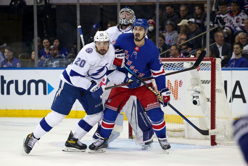 Apr 5, 2023; New York, New York, USA; New York Rangers left wing Chris Kreider (20) and Tampa Bay Lightning left wing Nicholas Paul (20) battle for position in front of Tampa Bay Lightning goalie Andrei Vasilevskiy (88) during the first period at Madison Square Garden. Mandatory Credit: Danny Wild-USA TODAY Sports