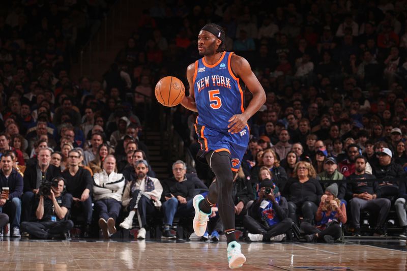 NEW YORK, NY - MARCH 10: Precious Achiuwa #5 of the New York Knicks dribbles the ball during the game against the Philadelphia 76ers on March 10, 2024 at Madison Square Garden in New York City, New York.  NOTE TO USER: User expressly acknowledges and agrees that, by downloading and or using this photograph, User is consenting to the terms and conditions of the Getty Images License Agreement. Mandatory Copyright Notice: Copyright 2024 NBAE  (Photo by Nathaniel S. Butler/NBAE via Getty Images)