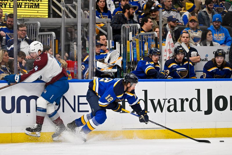 Dec 29, 2023; St. Louis, Missouri, USA;  St. Louis Blues right wing Kevin Hayes (12) and Colorado Avalanche defenseman Bowen Byram (4) battle for the puck during the first period at Enterprise Center. Mandatory Credit: Jeff Curry-USA TODAY Sports