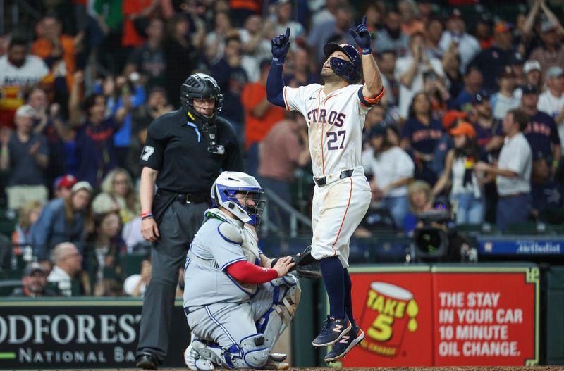 Apr 3, 2024; Houston, Texas, USA; Houston Astros second baseman Jose Altuve (27) crosses home plate after hitting a home run during the seventh inning against the Toronto Blue Jays at Minute Maid Park. Mandatory Credit: Troy Taormina-USA TODAY Sports