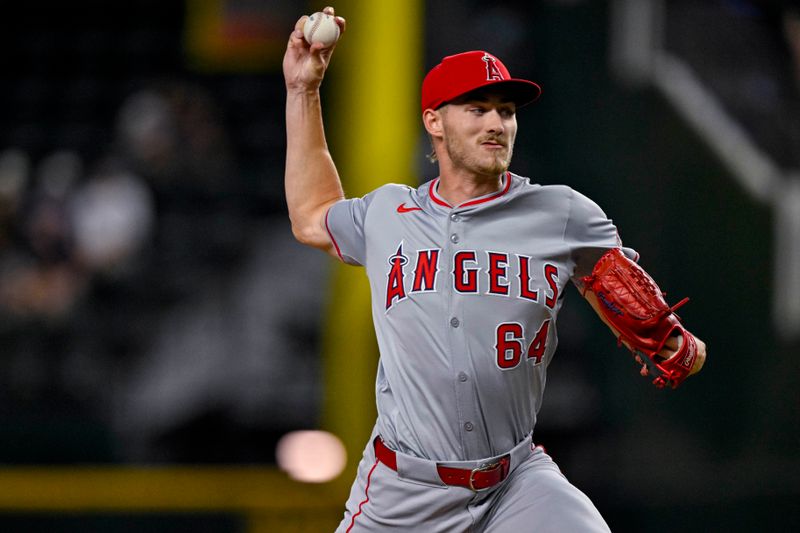 Sep 5, 2024; Arlington, Texas, USA; Los Angeles Angels starting pitcher Jack Kochanowicz (64) pitches against the Texas Rangers during the first inning at Globe Life Field. Mandatory Credit: Jerome Miron-Imagn Images