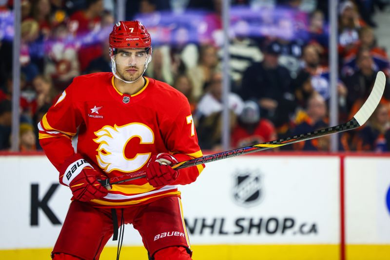 Nov 3, 2024; Calgary, Alberta, CAN; Calgary Flames defenseman Kevin Bahl (7) during the third period against the Edmonton Oilers at Scotiabank Saddledome. Mandatory Credit: Sergei Belski-Imagn Images