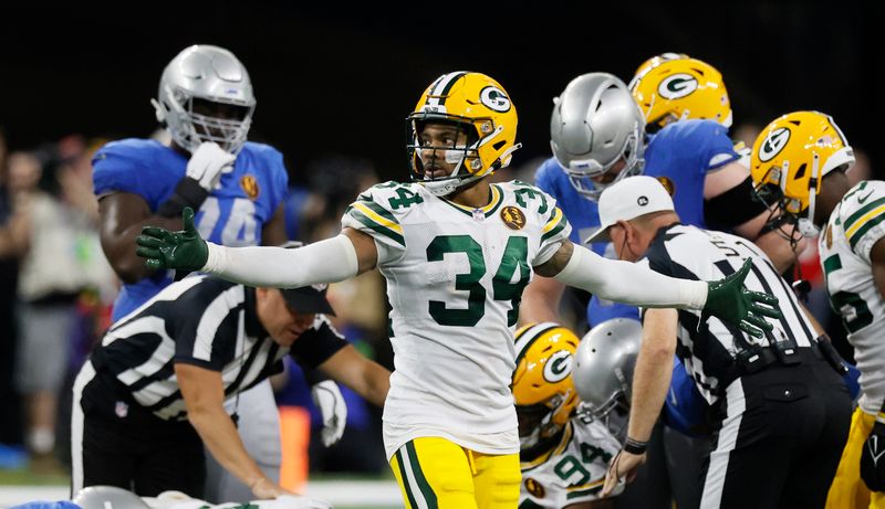 Green Bay Packers safety Jonathan Owens reacts after a play during the second half of an NFL football game against the Detroit Lions, Thursday, Nov. 23, 2023, in Detroit. (AP Photo/Duane Burleson)