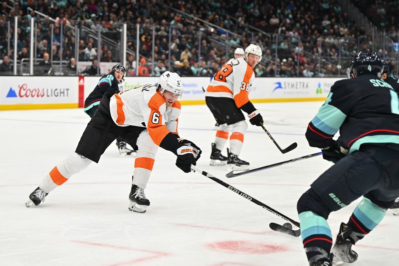 Feb 16, 2023; Seattle, Washington, USA; Philadelphia Flyers defenseman Travis Sanheim (6) reaches for the puck during the second period against the Seattle Kraken at Climate Pledge Arena. Mandatory Credit: Steven Bisig-USA TODAY Sports