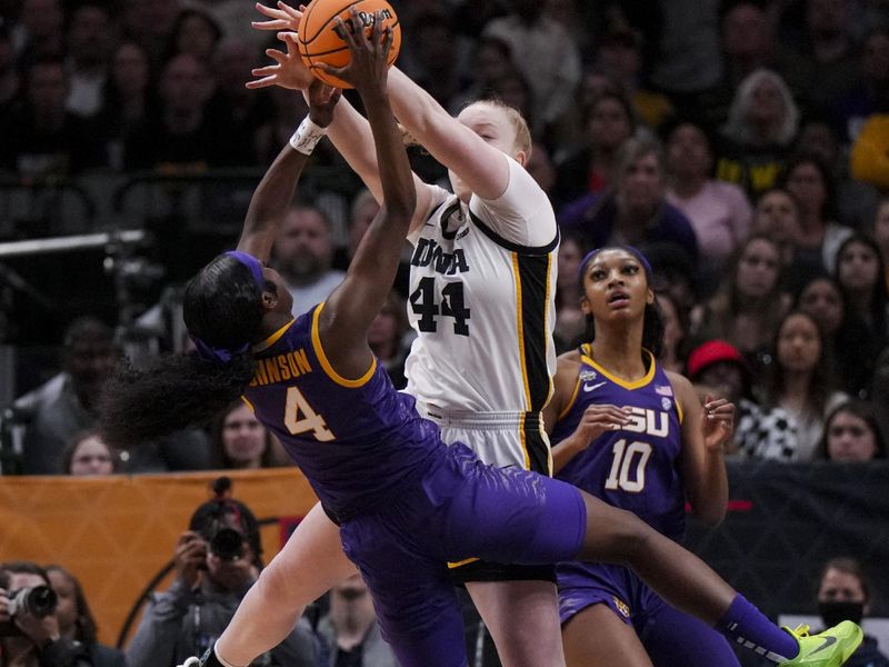 Apr 2, 2023; Dallas, TX, USA; Iowa Hawkeyes forward Addison O'Grady (44) defends against LSU Lady Tigers guard Flau'jae Johnson (4) in the first half during the final round of the Women's Final Four NCAA tournament at the American Airlines Center. Mandatory Credit: Kirby Lee-USA TODAY Sports