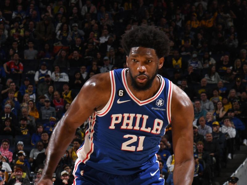 SAN FRANCISCO, CA - MARCH 24: Joel Embiid #21 of the Philadelphia 76ers dribbles the ball during the game against the Golden State Warriors on March 24, 2023 at Chase Center in San Francisco, California. NOTE TO USER: User expressly acknowledges and agrees that, by downloading and or using this photograph, user is consenting to the terms and conditions of Getty Images License Agreement. Mandatory Copyright Notice: Copyright 2023 NBAE (Photo by Noah Graham/NBAE via Getty Images)